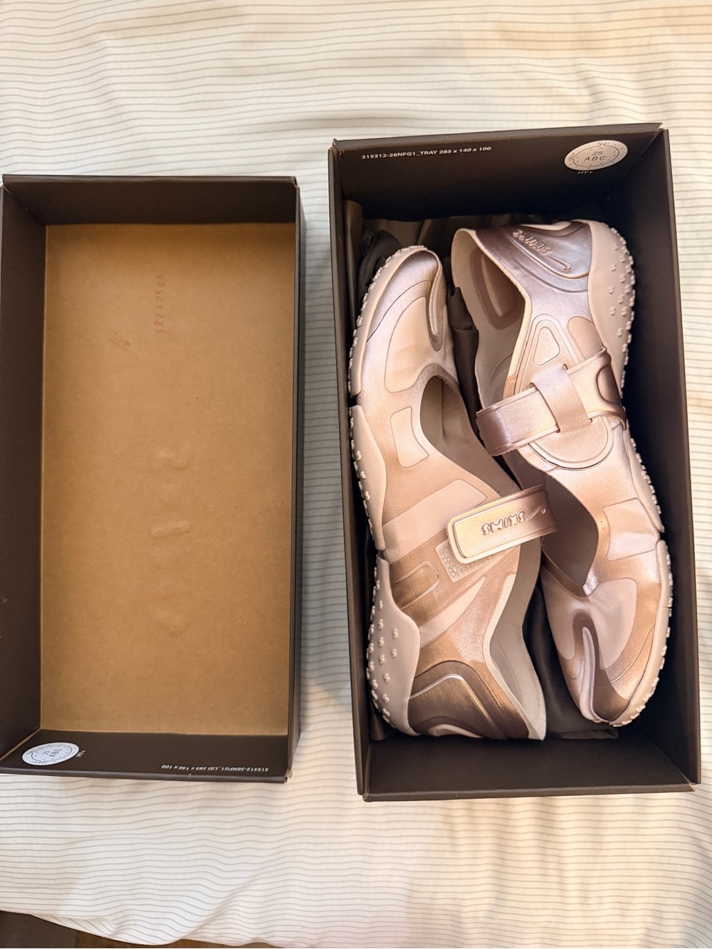 SKIMSxNike collab Satin air rift tabis in blush pink